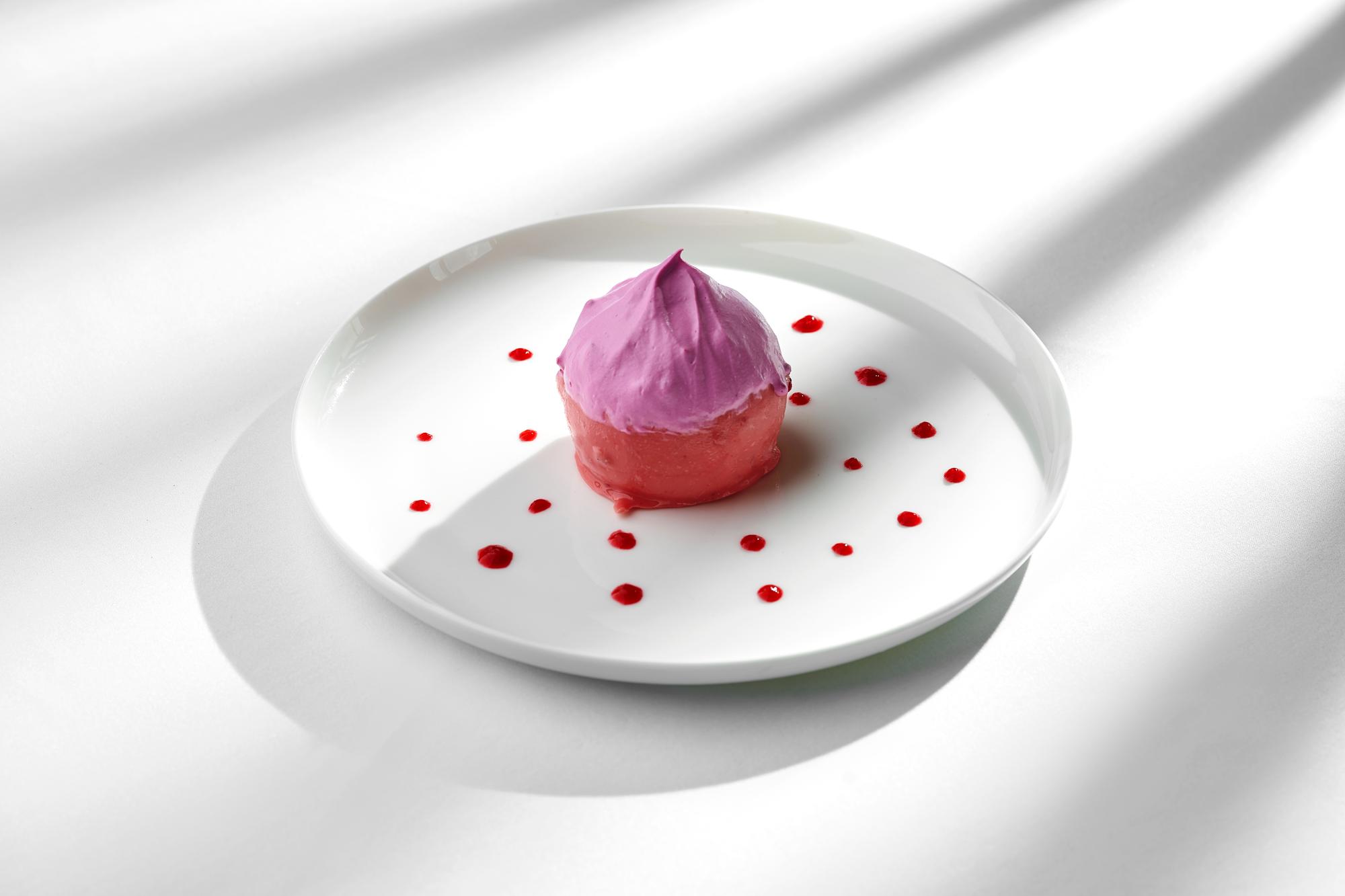 Macro of plated dessert with gleaming glaze